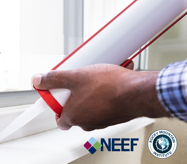 Close up of hand installing caulking in a window