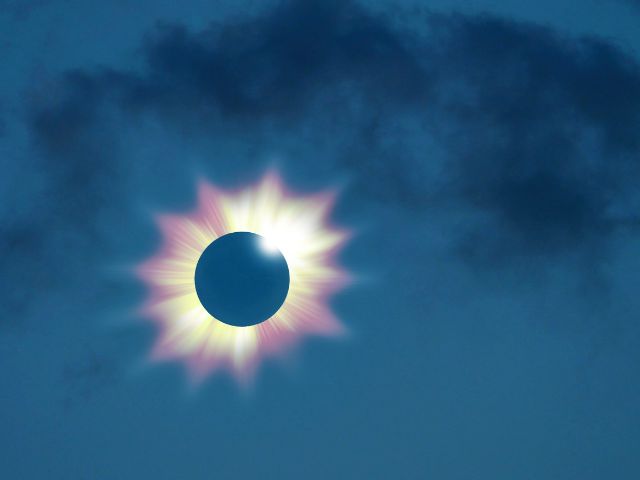 a total solar eclipse where the moon is covering the sun and only the sun's rays are visible