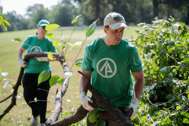 International Paper employees remove invasive species from Overton Park TN