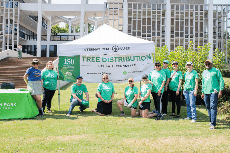 International Paper employees gather for tree planting in urban Overton Park 