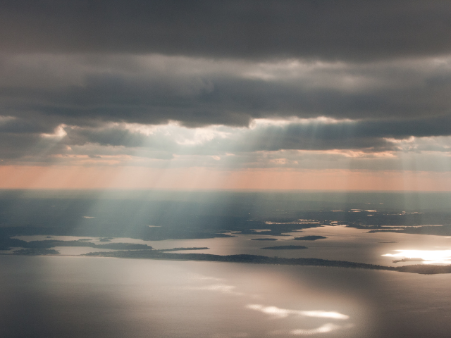 Sunlight filtering through the clouds over Chesapeake Bay.