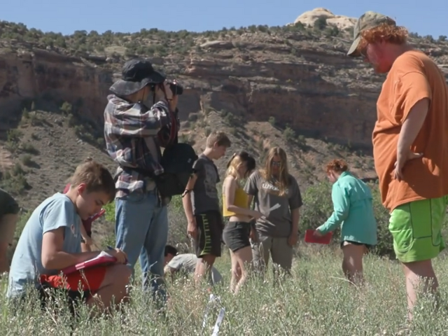 Students collecting data in the field at McInnis Canyons National Conservation Area in Colorado.