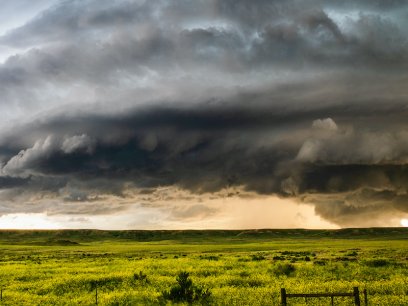 ominous weather cloud over a field