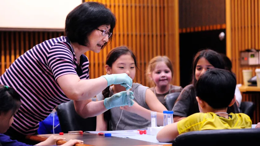 Huei Chen teaching children