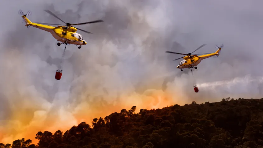 Helicopters fighting wildfires