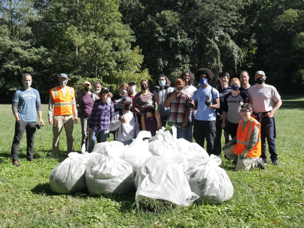 a group of volunteers stand together for a photo after a successful National Public Lands Day event