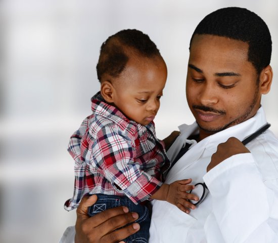 Pediatric doctor with his patient